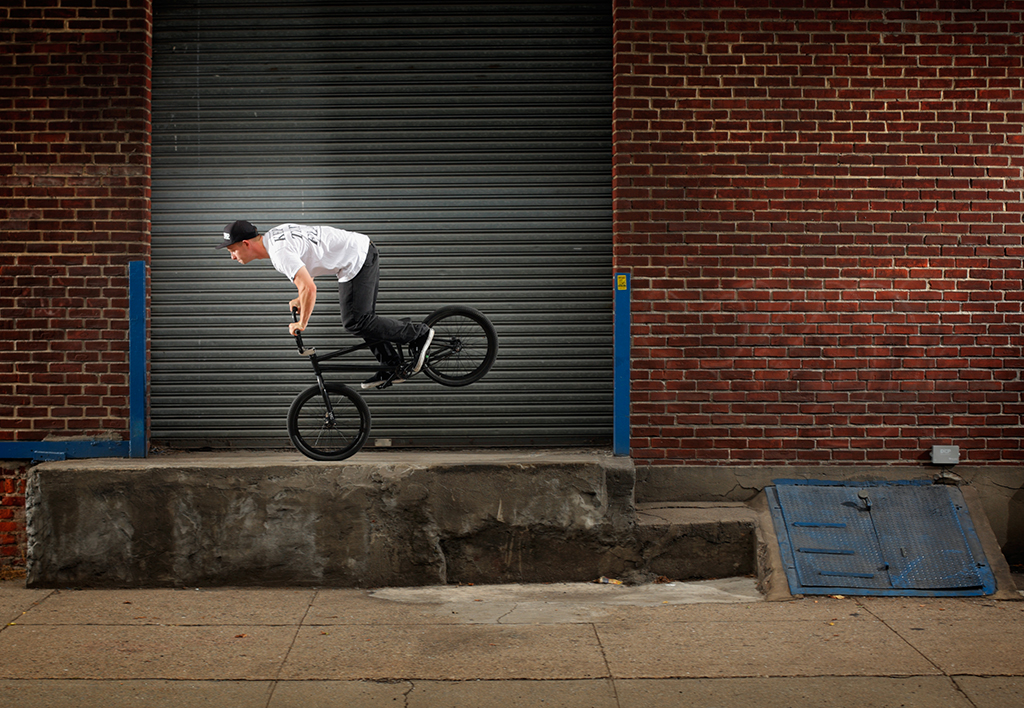 Scotty Wemmer does a nose manual across the ledge out of the cellar door